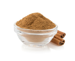 cinnamon in bowl on white
