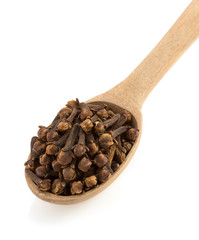 clove spices and spoon