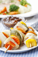 Shashlik made of fish and vegetables, party snack