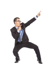 crazy businessman dancing  a funny gesture