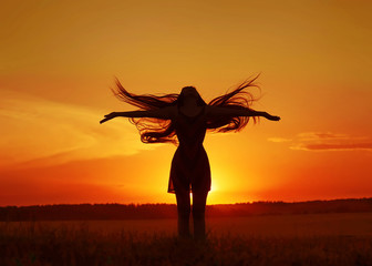 girl silhouette in the field