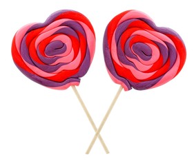Two colorful Valentines Day lollipops isolated on white
