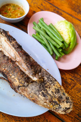 Grill snake head fish with salt coated
