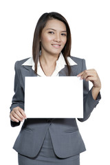 Fototapeta premium Young Asian business woman attractive brunetee showing blank sig