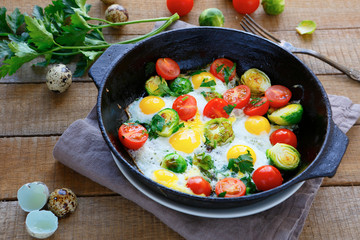 fried eggs with vegetable mix