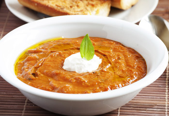 white bowl full of fresh tomatoes soup