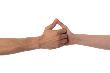 Two hands holding each other isolated over white
