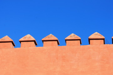fortified castle wall against sky