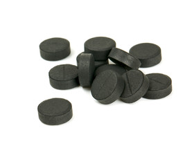 black pills isolated on white
