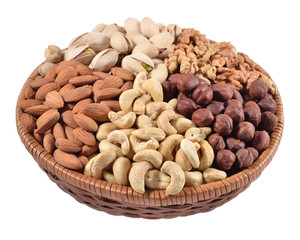 Assorted nuts in a wicker bowl on a white background