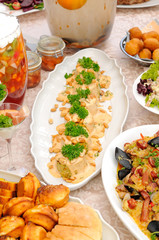 Table with seafood and salads