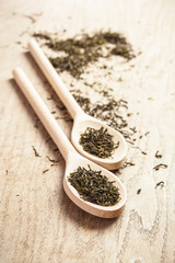 Dried green tea leaves