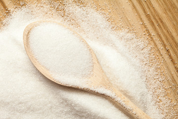 Spoon in a pile of sugar