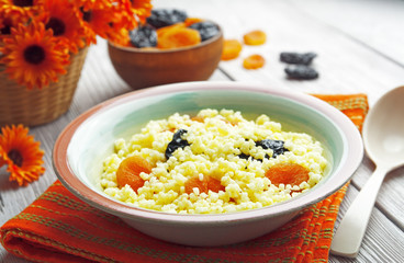 Millet porridge with dried fruit