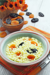 Millet porridge with dried fruit