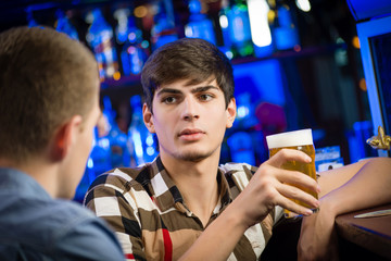 portrait of a young man at the bar