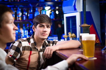 portrait of a young man at the bar