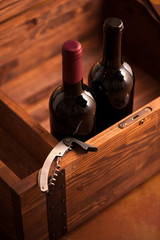 Wood case with bottles of wine