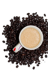 a cup of coffee and beans