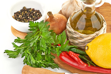 Fresh cooking ingredients with olive oil