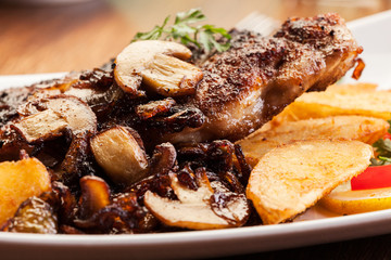 Fried pork chop with mushrooms