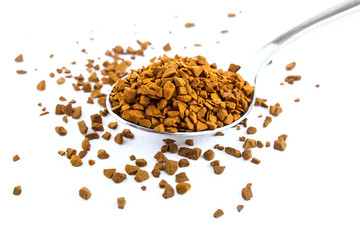 Spoon of coffee on  white background