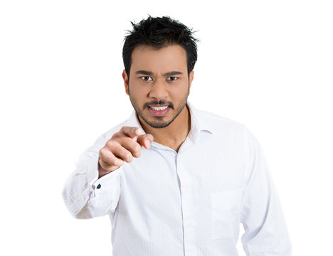 Angry man pointing, accusing someone of wrong doing