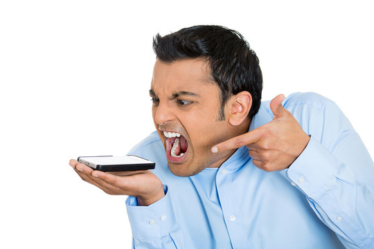 Man angry, frustrated  man yelling on a cell phone