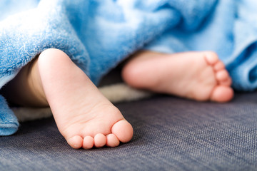 Baby feet with towel