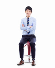 Young Asian business man sitting on the chair.