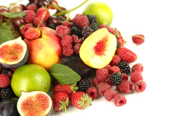 Fototapeta na wymiar Assortment of juicy fruits and berries, isolated on white