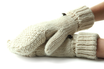Fototapeta na wymiar Hands in wool mittens, isolated on white