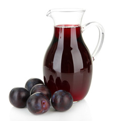 Delicious plum juice isolated on white