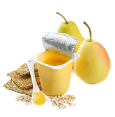 Tasty yogurt in open plastic cup, cookies and fruit, isolated