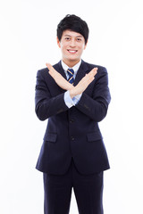 Young Asian man showing prohibit sign