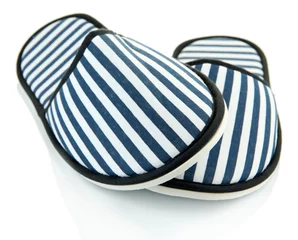 Selbstklebende Fototapeten Striped slippers isolated on white © Africa Studio