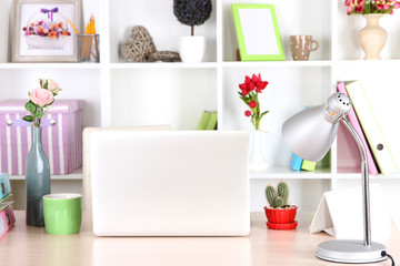 Workplace with laptop, close up