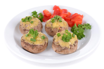 Stuffed mushrooms on plate isolated on white