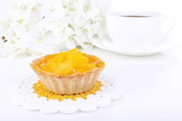 Tasty cake on table on light background