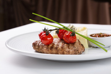 Grilled meat with trimmings