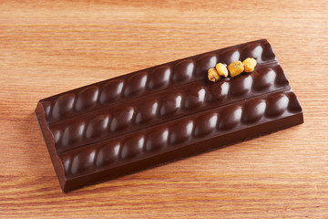 Dark chocolate bar with corn © raimunda-losantos