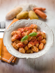 homemade gnocchi with tomato sauce, selective focus