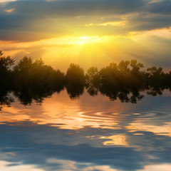 dramatic sunset over a lake