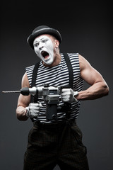 mime with hammer drill