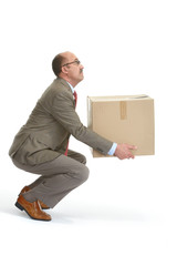 Businessman and a cardboard box