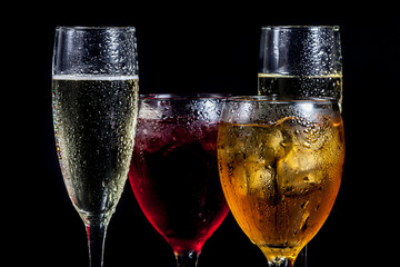 Several glasses of different drinks 