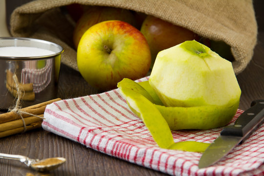 Peeled Apple With Ingredients For An Apple Pie