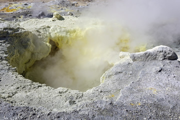 Sulfur fumarole in crater of active volcano. Kamchatka Peninsula