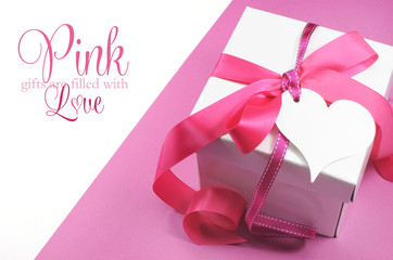 Beautiful pink and white gift box present with text