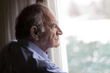 Fototapeta premium Close up of a senior man contemplating